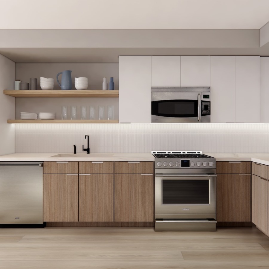 a kitchen with white and wood cabinets